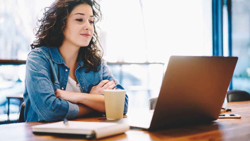 Student Looking into her Laptop