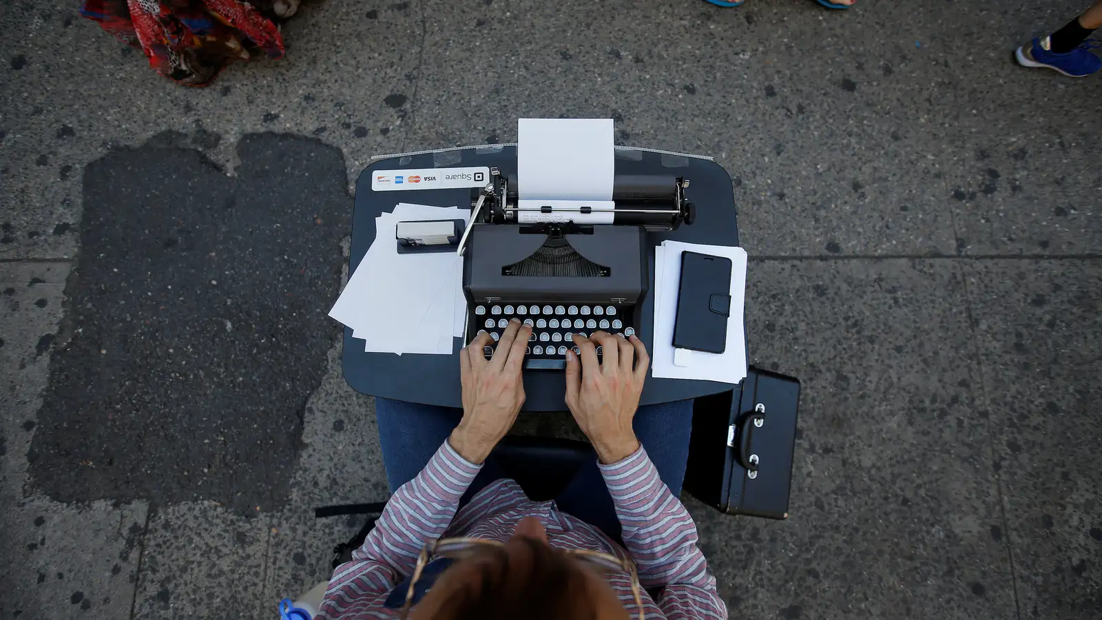 Student Typing on a Typewriter